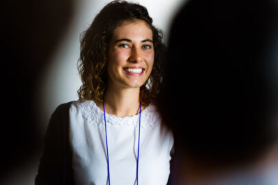 Following a presentation of her academic research at The European Conference on Arts & Humanities (ECAH) in Brighton, UK, a conference delegate answers questions from her audience.