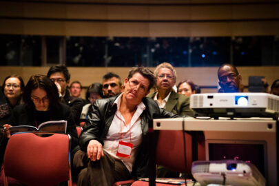 Delegates watch a plenary presentation at The Asian Conference on Language Learning (ACLL) in Kobe, Japan.