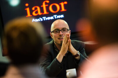 Following a presentation of his academic research at The European Conference on the Social Sciences (ECSS), a conference delegate answers questions from his audience.