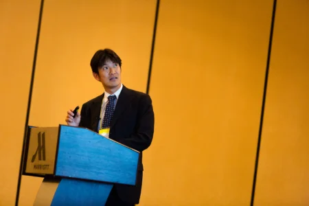 Takeshi Komoto, Executive Director of JETRO’s New York Office, delivers the Keynote Presentation “Abenomics and the Three Arrows” at The North American Conference on the Social Sciences (NACSS) in Rhode Island, USA. Takeshi Komoto Keynote at NACSS Rhode Island