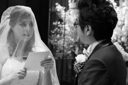 Bride delivering personal vows during her wedding ceremony in Osaka, Japan. Bride delivering personal vows during her wedding ceremony in Osaka, Japan.