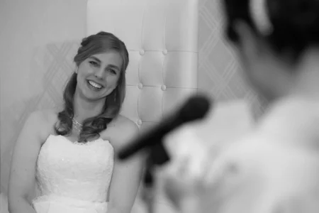 The bride’s best friend delivers a heartfelt speech during the reception. Bride’s best friend delivering a speech during their wedding reception in Osaka, Japan.