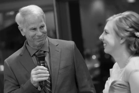 The father of the bride gives a speech during his daughter’s wedding reception. Father of the bride giving a speech during his daughter’s wedding reception in Osaka, Kansai, Japan.