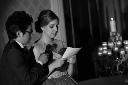 The bride reads a speech to her family during the reception. Bride reading a speech to her family during her wedding reception in Osaka, Japan.