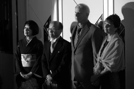 Family members listen as the bride reads her speech. Family members listening to the bride’s speech during her wedding reception in Osaka, Japan.