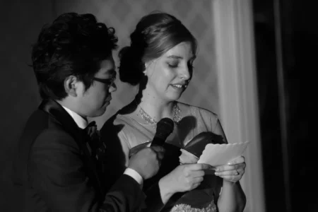 The bride reads a personal speech to her family during the reception. Bride reading a personal speech to her family during her wedding reception in Osaka, Kansai, Japan.