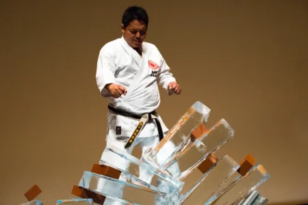 Sensei Hiroshi Nishioka, 5th Degree Black Belt and Master Instructor of Chito-Ryu Karate Do, leads an ice-breaking demonstration on “Power and Empowerment” at The Asian Conference on Education (ACE) in Kobe, Japan. Hiroshi Nishioka Karate Demonstration at ACE Kobe