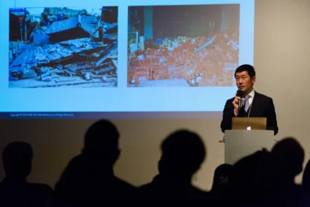 Takenosuke Yasufuku of Kobe Shushinkan Breweries discusses the impact of the 1995 Great Hanshin-Awaji Earthquake on the brewery, its reopening in 1997, and the role local businesses can play in supporting communities after natural disasters. Takenosuke Yasufuku at the Kansai Resilience Forum